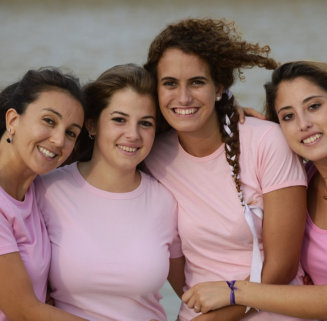 four women with a pink shirt