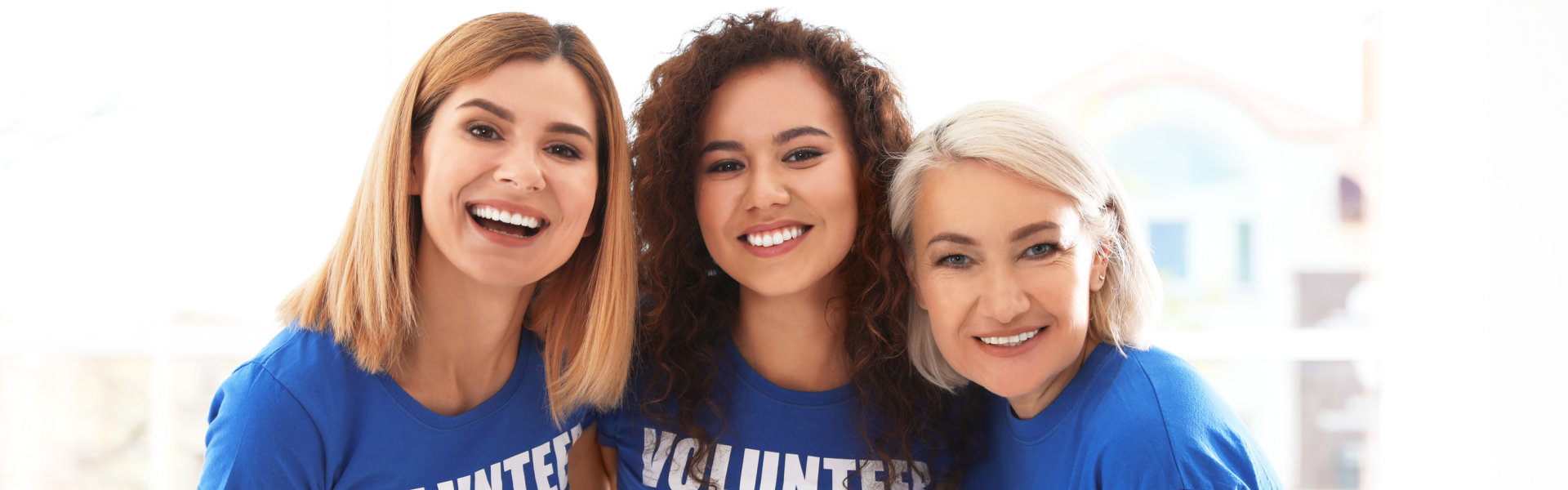 three women smiling